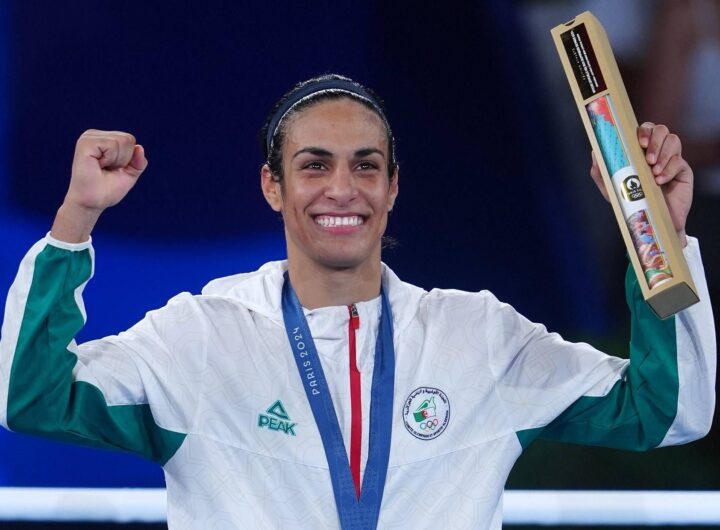"Imane Khelif, atleta determinata, difende la sua identità mentre punta all'oro olimpico, affrontando le polemiche di Trump."